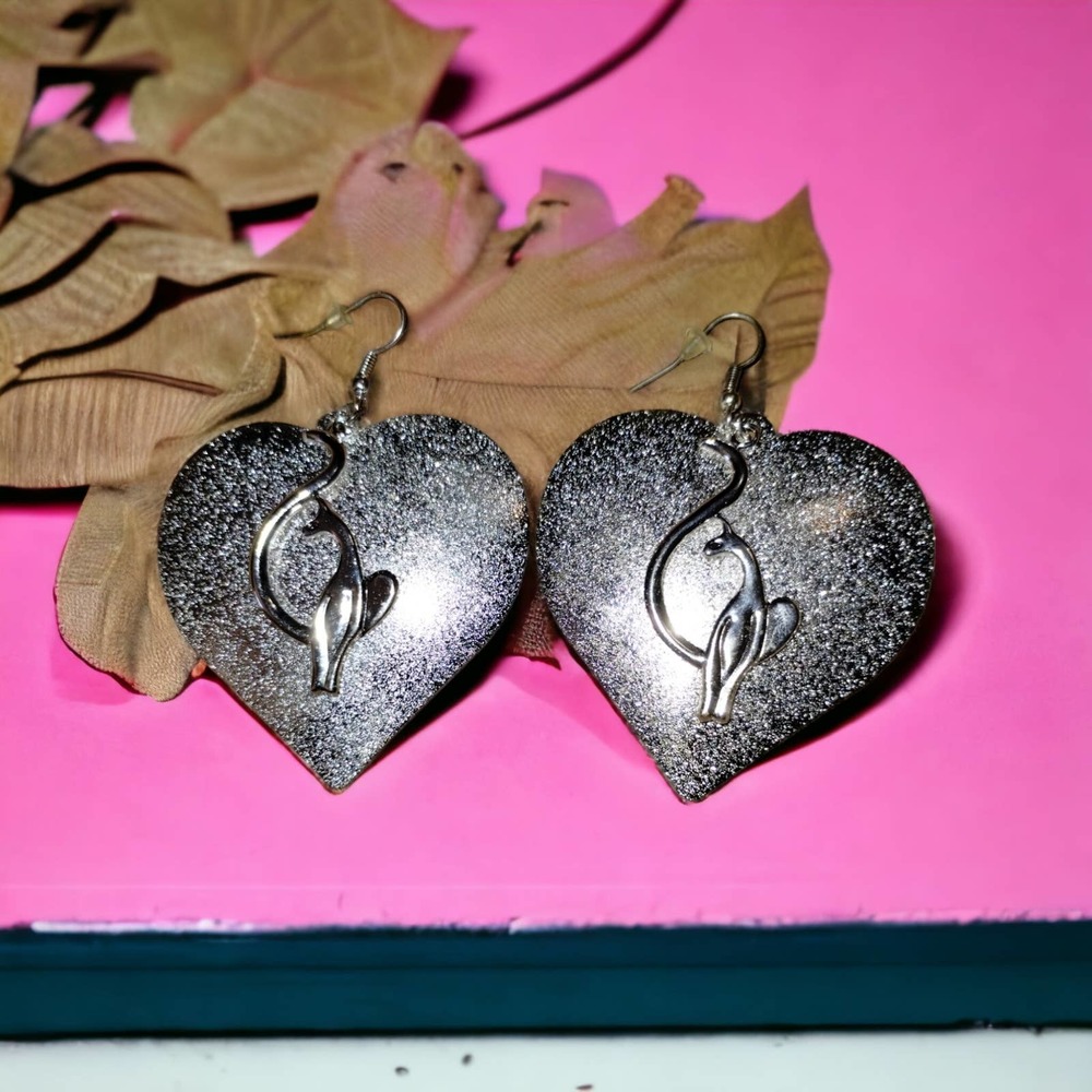 Gorgeous vintage Baby Phat silver heart earrings
